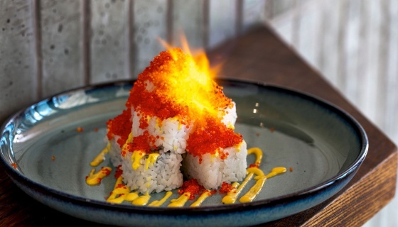 Sushi on a plate with flame